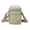 Bolsa transversal masculina, bolsa de ombro casual feminina leve com múltiplos bolsos, bolsa quadrada pequena estilo japonês e coreano, mochila horizontal em tecido de nylon