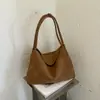 Bolso de axila de textura tejida de nicho nuevo transfronterizo bolso de mensajero retro moderno elegante estilo coreano estilo ins bolso de un solo hombro