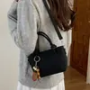 Bolso tipo cubo de tejido de alta gama para mujer, nuevo y elegante, estilo verano chic, de un solo hombro y cruzado