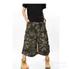 Comercio exterior camuflaje verano estilo coreano holgados deportivos casuales pantalones de longitud media pantalones de siete puntos para hombre por encima de la rodilla pierna ancha de moda marca jeans