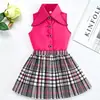 Conjunto de verano estilo coreano para niñas, diseñado para exportación: blusa sin mangas + falda plisada a cuadros, conjunto de dos piezas, en stock