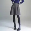 Saia de lã brilhante de cintura alta para mulheres, nova moda outono 2026 saia midi, saia elegante e emagrecedora de linha A elástica