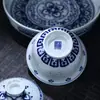 Set de Té Pequeño para Acampar al Aire Libre Un Gaiwan Tres Tazas Set de Té Gongfu Cerámica Azul y Blanca Linglong de Jingdezhen