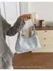 Bolso Tote Yozzi 2026 Modelo Nuevo de Primavera Color Sólido Estilo Coreano Gran Capacidad Bolso de Mano para Viajes Cotidianos Bolso de Hombro Casual Elegante