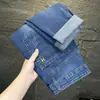 Atacado Transfronteiriço Primavera Outono Jeans Masculino Novo Slim Fit Perna Pequena Marca Tendência Macio Elástico Casual Resistente ao Desgaste Calças Longas
