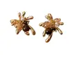 Pendientes de ojo de tigre Maillard con diseño de fuegos artificiales dorados para otoño e invierno para mujer 2026 nuevos pendientes vintage de lujo ligero de alta gama