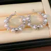 Aretes de aguja plateada con circonita y perlas redondas, exquisitos y elegantes, aretes versátiles con un toque de lujo ligero y sensación de alta gama, al por mayor