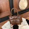 Bolso Retro Meilade de Moda para Mujer 2026 Nuevo Otoño Bolso Tote Pequeño para el Trabajo y los Viajes al Trabajo Bolso Cruzado de Hombro Tipo Cubo