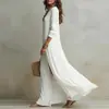 Moda femenina transfronteriza europea y americana 2026: Elegante y estiloso vestido de calle, hombros descubiertos, abertura, color liso, corte ajustado