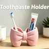 Portacepillos de dientes con forma de lazo transfronterizo, organizador de lavabo de escritorio, estante para cepillos de dientes y pasta de dientes, soporte de almacenamiento, estante de almacenamiento 3D