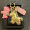 Año Nuevo del Caballo Oro Imitación Creativo Dibujo Animado Pony Llavero Cadena para Teléfono Colgante para Bolso Decoración Regalo de Cumpleaños