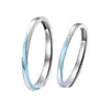 Anillo de pareja Möbius luminoso S999 nicho lujo ligero azul anillo de plata de ley S925 2025 nuevo