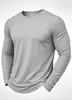 Nueva camiseta de manga larga estampada para hombre, color liso, estilo básico, adecuada para el uso casual diario y los viajes, una prenda básica simple y versátil para el armario