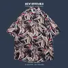 Camisa havaiana floral de manga curta, estilo retrô vetiver de Hong Kong, versão coreana da camisa da moda e estilosa para homens e mulheres, top para casal