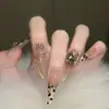 Parches para Manicura de Uñas Portátiles al por Mayor Hielo Transparente Puro Lust Camelia Mariposa Pegatinas de Uñas Terminadas Uñas Postizas Removibles