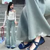 Calça Flare Jeans para Meninas Primavera e Outono 2026 Novo Estilo Coreano para Crianças Médias e Grandes Calça Flare Bordada com Laço na Barra