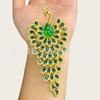 Broche colgante de pavo real de calcedonia verde incrustada transfronterizo Europa y Estados Unidos anti-luz pin de ramillete de pavo real colgante de jade explosiones en vivo