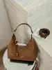 Bolso de mano de gamuza de moda en forma de media luna para mujer, bolso de hombro transfronterizo 2026 nuevo y moderno, bolso cruzado retro de nicho elegante
