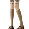 Calcetines Altos para Mujer Otoño/Invierno Calcetines Largos de Algodón con Zapatos de Cuero Pequeños Primavera/Otoño de Media Pantorrilla Adelgazantes Versátiles para Todas las Estaciones Calcetines Largos de Caña Alta