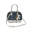 Bolso de Mano de Lujo de Gama Alta de Nicho para Mujer, Nuevo Bolso Cruzado de Hombro con Graffiti de Verano 2026, Bolso Cruzado tipo Concha para Viajes