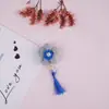 Material hecho a mano tejido flor borla accesorios para cabello largo aretes pinza para el cabello accesorios al por mayor flor de lana DIY