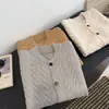 Chaleco de punto sin mangas cruzado de un solo botón con diseño trenzado estilo coreano para mujer, nueva chaqueta cárdigan suéter de punto para otoño en capas