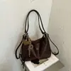 Bolsa Tote de Moda para Viajes de Otoño 2026 Mochila Retro de Gran Capacidad Bolso de Hombro Cruzado Simple de Color Sólido