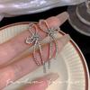 Pendientes de borlas exquisitos con diamantes brillantes de estilo coreano, pendientes de lazo largos elegantes de lujo y ligeros de alta gama, pendientes explosivos que combinan con todo.