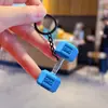 Chaveiro Pingente Haltere Fitness Estilo Esportivo Criativo Pingente para Carro de Casal Pingente para Mochila Escolar Pequeno Presente Atacado