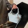 Padrão Lichia Moda Casual Bolsa Balde Feminina 2025 Nova Bolsa de Ombro Fashionável Trabalho Deslocamento Estilo Ocidental Bolsa Transversal Texturizada