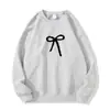 Novos Tops Americanos de Nicho Simples com Laço de Manga Longa para Mulheres Outono e Inverno Roupas de Exterior Casuais Versáteis Blusões Soltos para Mulheres