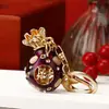 Chaveiro Criativo de Metal Trevo de Quatro Folhas para Carro Pingente de Bolsa Feminina Anel de Chaveiro Exportação Aliexpress Pequenos Presentes Atacado