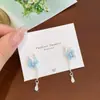 Pendientes de Mariposa con Borla de Perlas de Resina Super Hada Coreanos para Mujer, Aguja de Plata, Dulces, Elegantes, Lujo Ligero, Gama Alta, Pendientes Versátiles