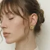 Populares Aretes de Margarita Tridimensionales de Amazon en Oro y Plata, Accesorios de Moda Callejera Europea y Americana Bicolor, Ventas Directas de Fábrica