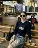 Guangzhou Shisanxing 220g Algodón Acanalado Capa Base para Mujer, Ajuste Delgado, Manga Larga para Verano, Directo de Fábrica, Suministro Exclusivo Segunda Remesa