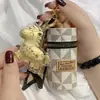 Shuibei mismo estilo oro puro 999 colgante cubo de lápiz labial llavero colgante caballo dorado pequeño colgante
