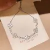 Pulsera de Flor de Madreperla con Circonita de Lujo Ligero Estilo Francés con un Diseño Único, Exquisita y Versátil, Joyería de Alta Gama