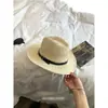 Sombrero de paja Panama japonés para mujer, nuevo modelo 2026, tejido hueco, ala ancha, protector solar, unisex, estilo jazz, para vacaciones en la playa