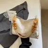 2026 Moda Casual Personalidade Bolsa de Ombro Único Primavera Nova Chegada Tendência Bolsa Feminina Design de Nicho Textura Bolsa de Axila