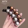 Nuevo Exquisito Pinza de Plátano de Perla Pinza de Cola de Caballo de Alta Calidad Pinza para el Cabello para Mujeres Temperamento Elegante Pinza Vertical Antideslizante Accesorios para el Cabello Tocado