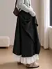 Pantalones falda de fideos de arroz negros para mujer, nuevo estilo otoño 2026, corte holgado y relajado, talla petite, con ribete de encaje y pierna ancha