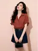 Camisa de manga corta con solapa estilo lino de alta gama y elegante, con un ambiente veraniego relajado, diseño holgado y top único de botones.