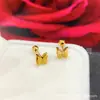 Série Borboleta aço titânio não desbota fivela torcida haste de osso da orelha borboleta prensada com areia galvanoplastia a vácuo 18k brincos anti-perda