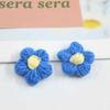 Bonita flor de lana de hojaldre, broche de flores de punto hecho a mano, pequeño material decorativo hecho a mano, accesorios para el cabello para niños.