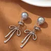 Pendientes de Bobina de Mosquito para Mujeres Sin Perforaciones, Pendientes de Perlas de Alta Gama, Pendientes de Estilo Francés al por Mayor, Lujo Ligero de Instagram, Simples y Elegantes