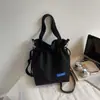 Bolso de Hombro Ligero y Sencillo con Cierre de Cordón para Mujer 2025 Nueva Moda Versátil Estilo Coreano Cruzado Bolso Cubo