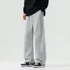 Otoño/Invierno 2025 Nuevos Pantalones Casuales de Pierna Ancha con Caída Sueltos Cómodos Versátiles Tendencia de Moda Pantalones de Punto Raya Lateral