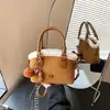 Bolso de axila retro de alta costura para mujer, nuevo modelo de invierno 2026, bolso de mano casual de gran capacidad, bolso tipo cubo, bolso de hombro