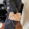 Bolso Nicho de Alta Gama para Mujer Otoño e Invierno 2025 Nuevo Bolso Bandolera Retro de Cuero Suave Cartera de Mujer Bolso de Cubo Plisado