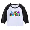 Camiseta infantil de primavera y otoño 2023, nueva camiseta de manga larga con cuello redondo y dibujos animados, camiseta de algodón para bebés y niños.
